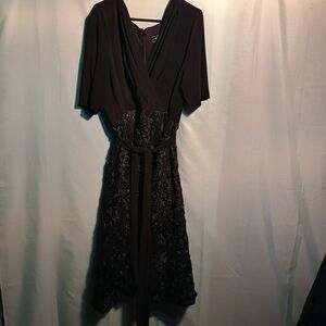 Elegant Black Dress with Floral Embroidered Skirt & Sash – Short Sleeve
